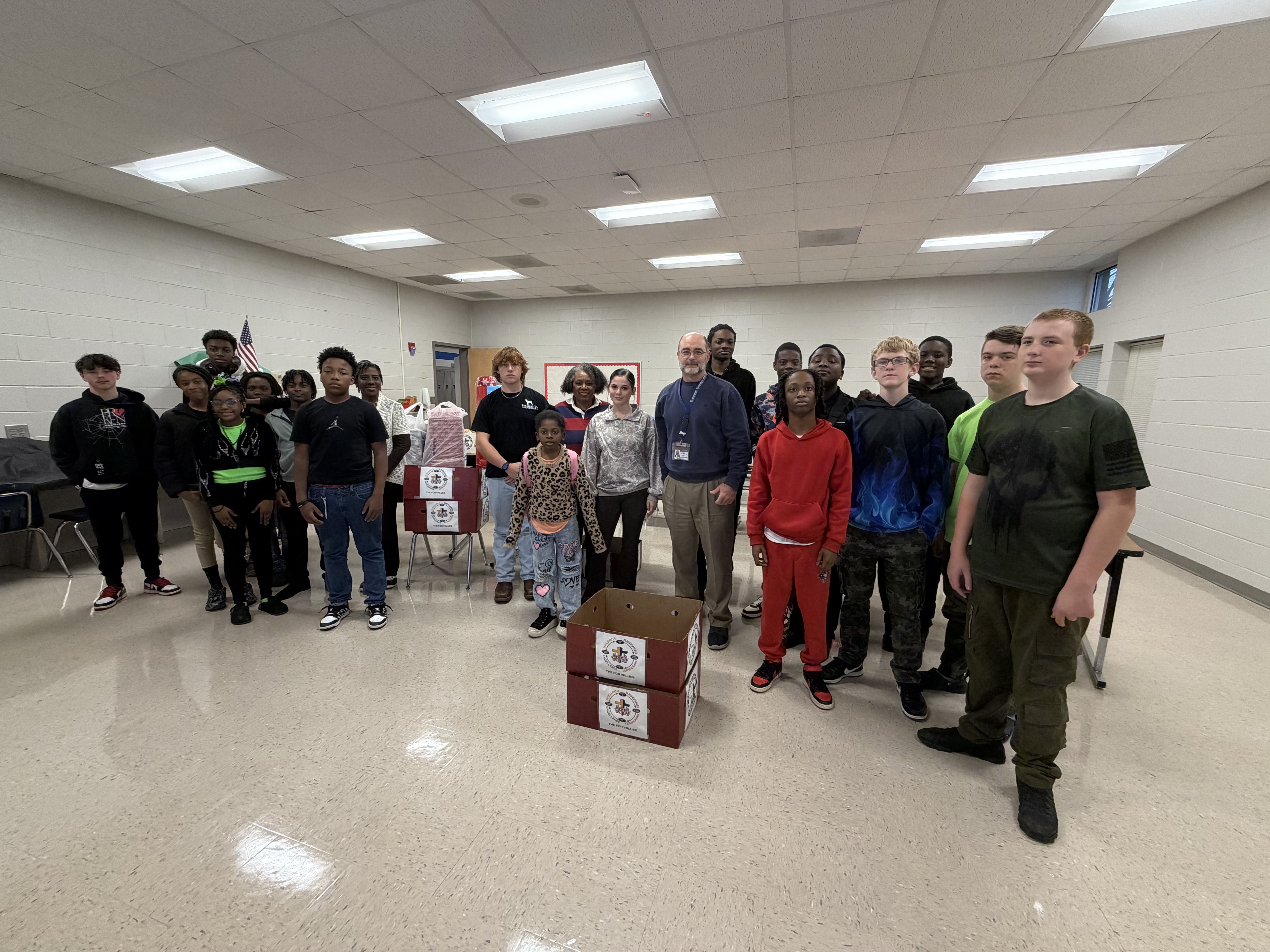 Church members assembling outreach supplies